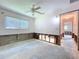 Spacious bedroom featuring a ceiling fan and a window for natural light at 9631 Oak Ne St, St Petersburg, FL 33702