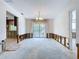 Dining room with chandelier and patio view, ready to be restored and personalized at 9631 Oak Ne St, St Petersburg, FL 33702