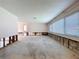 Interior shot of home's living space with large window and open floor plan at 9631 Oak Ne St, St Petersburg, FL 33702