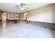 Bright living room with tile flooring, open space, and ample natural light at 9631 Oak Ne St, St Petersburg, FL 33702