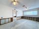 Open-concept living room with ceiling fans and natural light; customize to your dream at 9631 Oak Ne St, St Petersburg, FL 33702