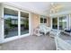 Outdoor patio with seating, offering views of lush greenery and landscaping at 9631 Oak Ne St, St Petersburg, FL 33702