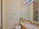 Bathroom featuring tile floors, a vanity, and shower at 16227 Cape Coral Dr, Wimauma, FL 33598