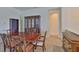Classic dining room with vintage-style furniture and a built in cabinet for storage at 16227 Cape Coral Dr, Wimauma, FL 33598