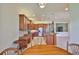 Spacious kitchen boasts an island and flows into the dining and living areas at 16227 Cape Coral Dr, Wimauma, FL 33598