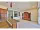 Open living space flows from the kitchen with lots of room to entertain and access to the pool at 16227 Cape Coral Dr, Wimauma, FL 33598