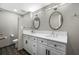Bathroom with double sink and toilet at 1 Beach Se Dr # 1902, St Petersburg, FL 33701