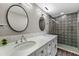 Bathroom features double sinks and walk-in shower at 1 Beach Se Dr # 1902, St Petersburg, FL 33701