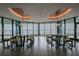 Bright dining area with elegant tables, stools, and scenic views at 1 Beach Se Dr # 1902, St Petersburg, FL 33701