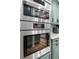 Bosch stainless steel built-in microwave and oven appliances in modern kitchen at 1 Beach Se Dr # 1902, St Petersburg, FL 33701