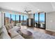 Spacious living room with a comfortable sofa, stylish rug, and stunning city views at 1 Beach Se Dr # 1902, St Petersburg, FL 33701