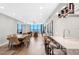 Bright living room showcasing contemporary design, dining area, and ocean views at 1 Beach Se Dr # 1902, St Petersburg, FL 33701
