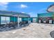 Large patio area with tables, seating, grills, and covered areas to enjoy outdoor activities at 1 Beach Se Dr # 1902, St Petersburg, FL 33701