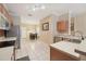 Functional kitchen space that opens to a dining area, creating an open and airy feel at 10263 Devonshire Lake Dr, Tampa, FL 33647