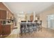 Kitchen island with barstool seating provides an inviting gathering spot in the home at 10263 Devonshire Lake Dr, Tampa, FL 33647