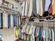 Functional walk-in closet with custom shelving for optimized storage space at 10713 Shady Preserve Dr, Riverview, FL 33579