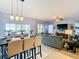Bright living space features a dining area with access to outdoor views and a comfortable seating area at 10713 Shady Preserve Dr, Riverview, FL 33579