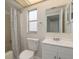Bathroom with vanity, mirror, toilet and shower at 10841 Casa Grande Ave, Port Richey, FL 34668