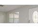 Cozy living room featuring light walls, a new front door and laminate floors at 10841 Casa Grande Ave, Port Richey, FL 34668