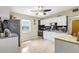Functional kitchen featuring white cabinets, black subway tile backsplash, and stainless steel appliances at 1115 45Th N St, St Petersburg, FL 33713