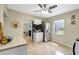 Bright kitchen with stainless steel appliances, white cabinets, and an adjacent dining area at 1115 45Th N St, St Petersburg, FL 33713