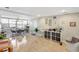 Spacious open-plan living and dining area with tiled floors and bright, natural light at 1115 45Th N St, St Petersburg, FL 33713