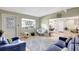 Spacious living room with neutral colors, tile flooring, and comfortable seating at 1115 45Th N St, St Petersburg, FL 33713
