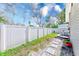 Fenced backyard with patio and furniture provides privacy and space for outdoor relaxation and entertainment at 112 11Th Ave, Indian Rocks Beach, FL 33785