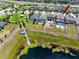 Aerial view of lakeside community with private docks and a neighborhood playground at 11320 Chilly Water Ct, Riverview, FL 33569