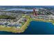 Beautiful lakeside homes with community amenities, including a playground and a dock at 11320 Chilly Water Ct, Riverview, FL 33569
