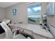 This bedroom has a desk and a view of the water, providing a comfortable and functional space at 11320 Chilly Water Ct, Riverview, FL 33569