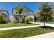 Charming two-story home with landscaped front yard and well-manicured lawn at 11320 Chilly Water Ct, Riverview, FL 33569
