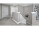 Upstairs hallway with carpet, showing access to rooms in the home at 11320 Chilly Water Ct, Riverview, FL 33569