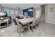 Open concept dining and living room with stairs to the second floor at 11320 Chilly Water Ct, Riverview, FL 33569
