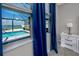 View of the screened pool from bedroom window at 11320 Chilly Water Ct, Riverview, FL 33569