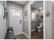 Well-lit half bath area is conveniently located near the entrance at 12090 Thames Ave, Weeki Wachee, FL 34614