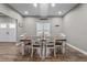 Inviting dining room features hardwood floors and lots of natural light at 12090 Thames Ave, Weeki Wachee, FL 34614