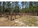 Fenced pasture area, ideal for livestock with secure perimeter fencing and ample space at 12090 Thames Ave, Weeki Wachee, FL 34614