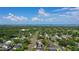 An aerial view of the property with stunning views and lush landscaping at 1290 Michigan Blvd, Dunedin, FL 34698