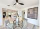 Dining area featuring a glass table, modern chairs, and an open floor plan offers a comfortable place to dine at 1290 Michigan Blvd, Dunedin, FL 34698