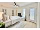Spacious main bedroom with fireplace and outdoor access offers comfort and style at 1290 Michigan Blvd, Dunedin, FL 34698