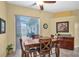 Casual dining space with a view of the outdoor patio at 137 Woodcreek E Dr, Safety Harbor, FL 34695