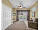 Comfortable sitting room with view of the backyard pool at 137 Woodcreek E Dr, Safety Harbor, FL 34695