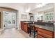Bathroom with a vanity, granite countertops and large mirror at 16039 Ternglade Dr, Lithia, FL 33547