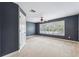 Bedroom with a ceiling fan and a large window with shutters allowing natural light at 16039 Ternglade Dr, Lithia, FL 33547