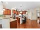 Kitchen with granite counters, stainless appliances, and a breakfast bar at 16039 Ternglade Dr, Lithia, FL 33547