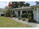 Charming single-story home with manicured landscaping and a welcoming entrance at 1665 Grove St, Clearwater, FL 33755