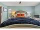 Cozy bedroom with a large bed, accent pillows, and soft, shag blanket at 1720 Fruitridge St, Brandon, FL 33510