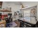 Versatile bonus room with desk, air hockey table, and ceiling fan at 1720 Fruitridge St, Brandon, FL 33510