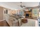 Inviting living room with stone fireplace, sectional sofa, and adjacent dining area at 1720 Fruitridge St, Brandon, FL 33510